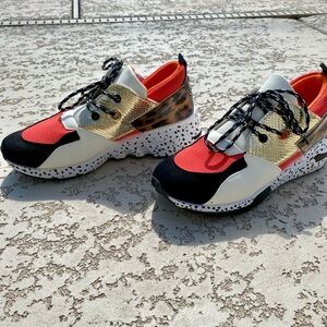 Stylish Women's Sneakers in Red, Black, and Gold